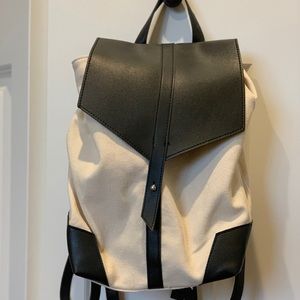 Canvas and leather adjustable backpack